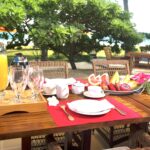 dining table outside terrace pool